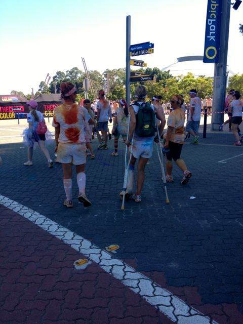 Not even crutches and a heavy cast would stop this lady being part of it!