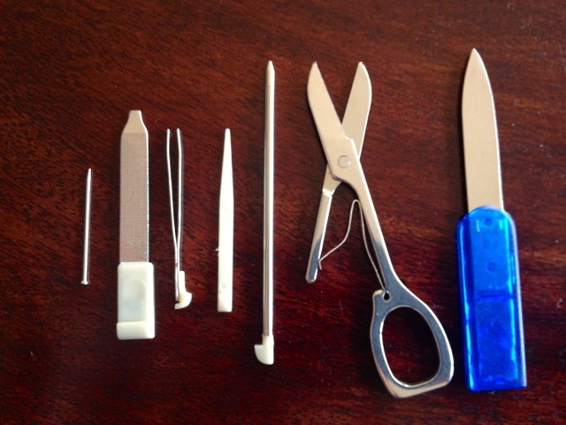 Don't be fooled - the nail file and screwdriver are on the same little tool. AMAZING.