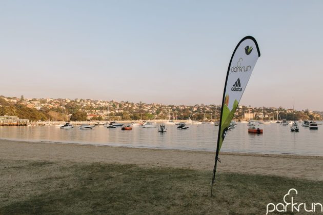 Flagging the end of the run.  [image from Mosman parkrun Facebook page]